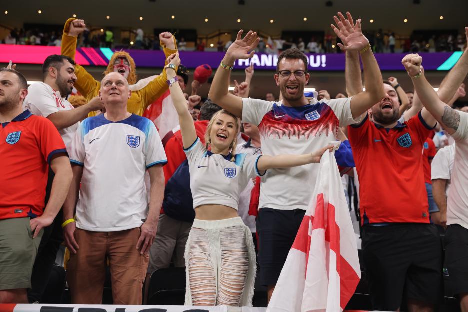 England fans cheer at the World Cup match against Senegal.