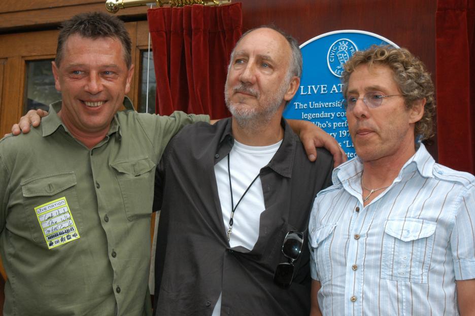 Andy Kershaw, Pete Townshend, and Roger Daltrey unveiling a blue plaque at Leeds University.