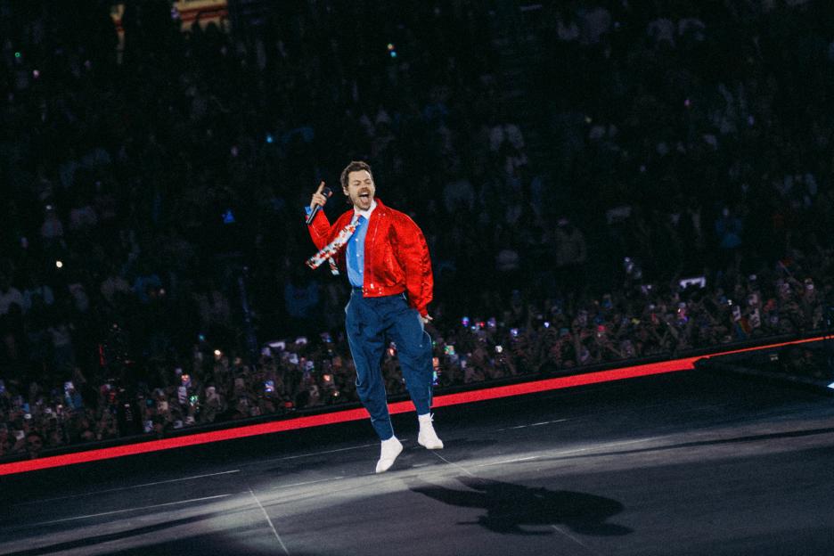 Harry Styles performing on stage during the "Together, Together Tour."