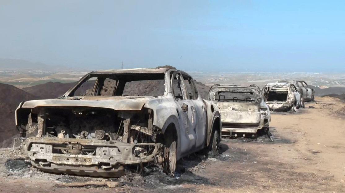Deadly wildfire in Spain leaves charred cars in Bedar, Almeria province