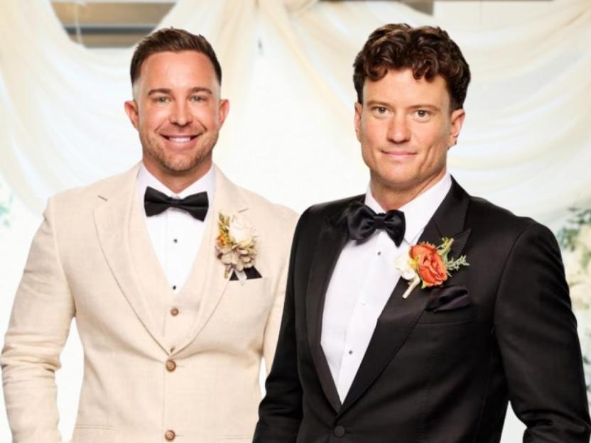 Sam Stanton and Chris Robinson wearing suits and bow ties.