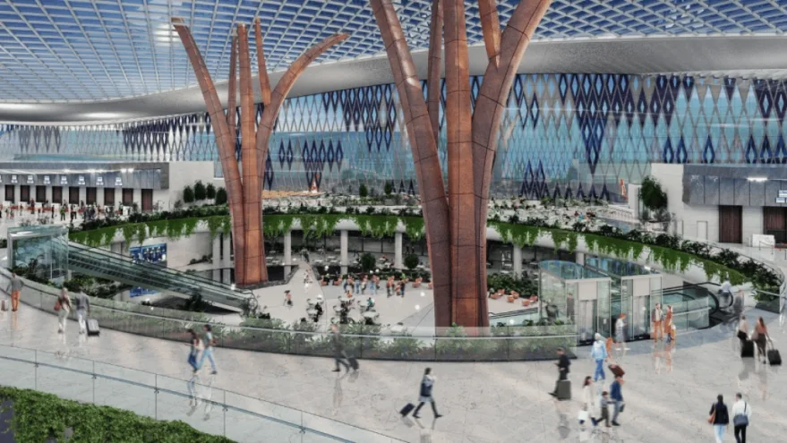 Illustration of the interior of the new Trabzon Airport terminal, featuring large tree-like columns, a sunken courtyard, and a glass ceiling.