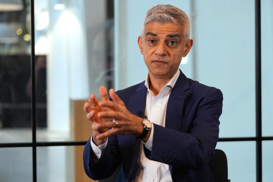 Mayor of London Sadiq Khan speaking during an interview, gesturing with his hands.