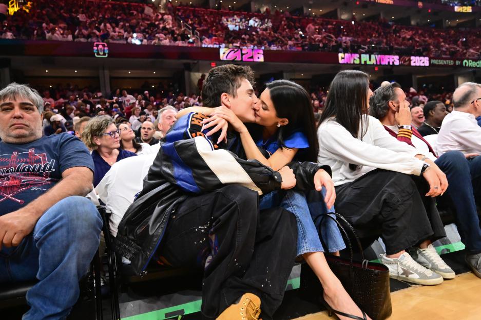 American actor Timothée Chalamet and Kylie Jenner kissing at an NBA playoff game.