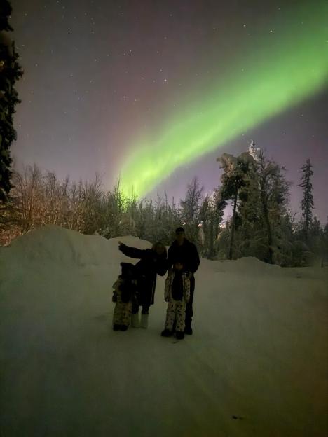 Phil Foden and his family in Lapland under the Northern Lights.
