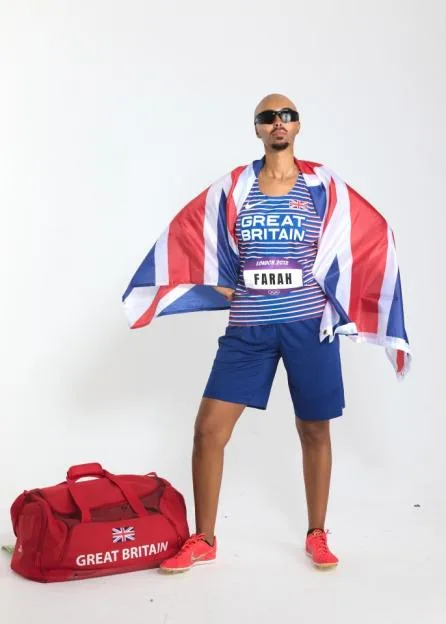 Maya Jama dressed in a Halloween costume as Mo Farah, wearing a Great Britain running vest, sunglasses, and a Union Jack flag.