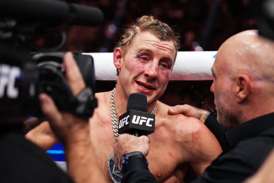 Joe Rogan interviews injured Paddy Pimblett after a UFC fight.