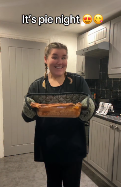 Becky Jones holding a baked pie.