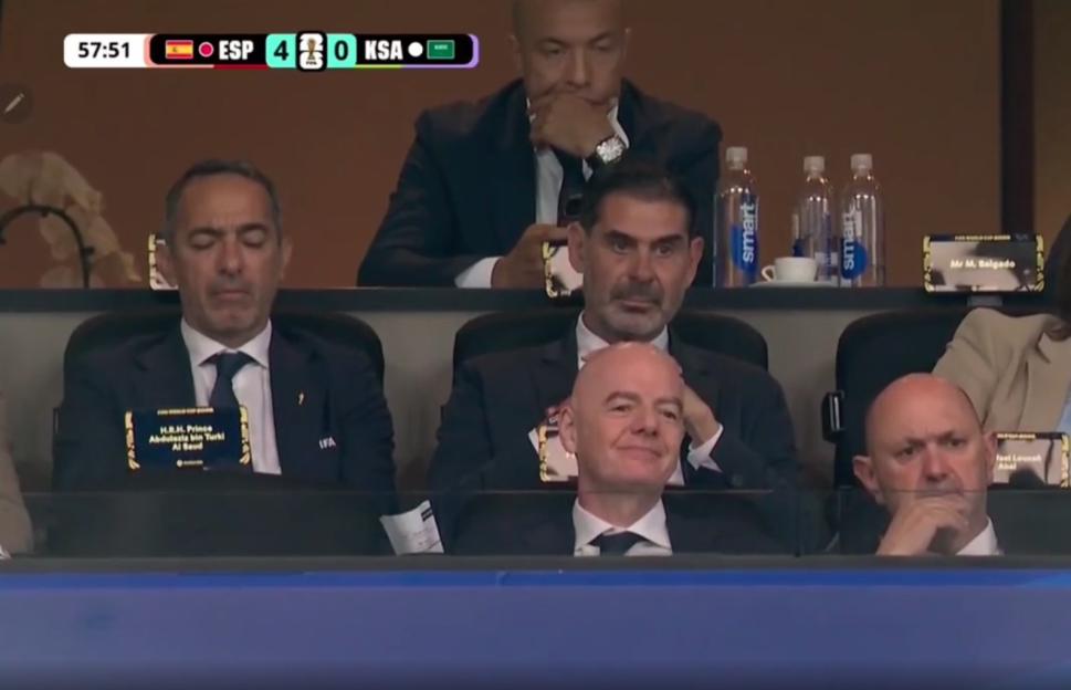 'World Cup Official's Awkward Nap Behind FIFA Chief Gianni Infantino During Spain vs. Saudi Arabia Match'
