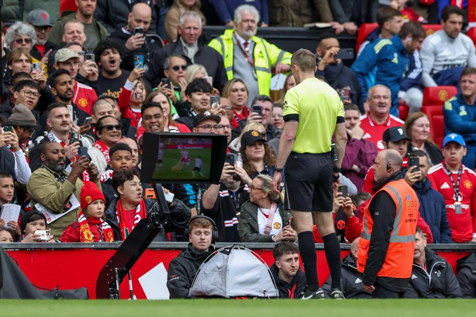 Referee Michael Salisbury views the VAR screen during the Manchester United v Nottingham Forest Premier League match at Old Trafford, Manchester, England on 17 May 2026 Credit: Phil Duncan/Every Second Media