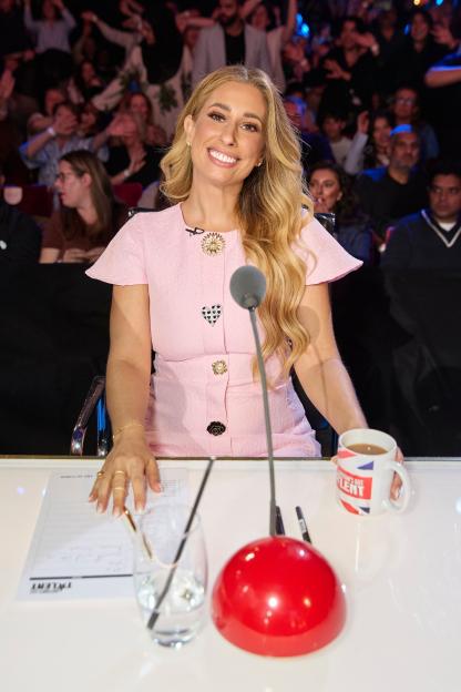 Stacey Solomon smiling as a judge on "Britain's Got Talent Unseen."