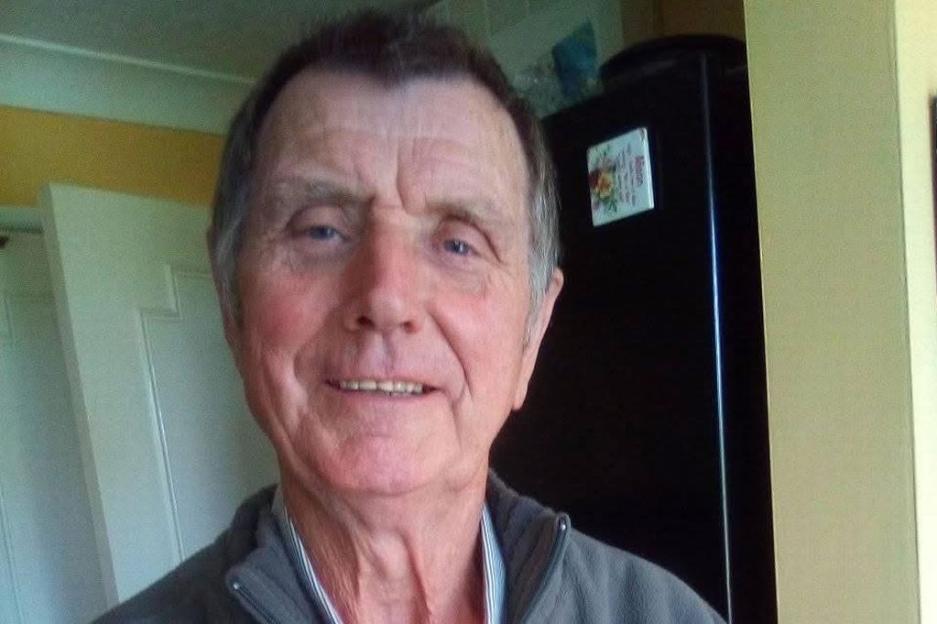 Headshot of Peter Hayes, a man with blue eyes and a slight smile.