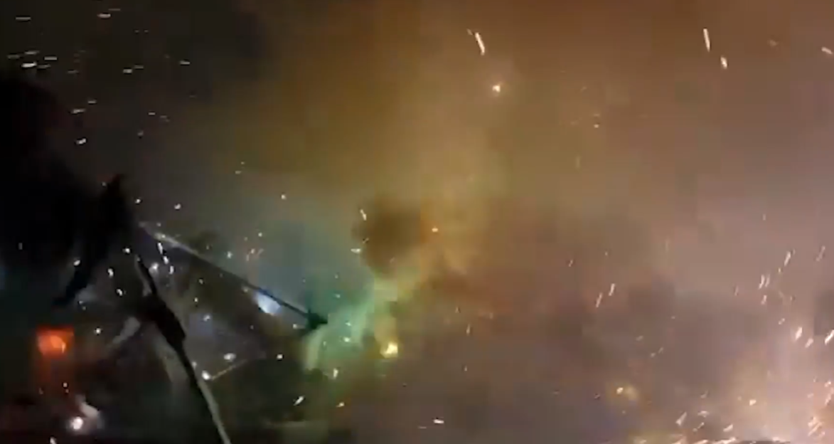 Out-of-control fireworks exploding with sparks and smoke.