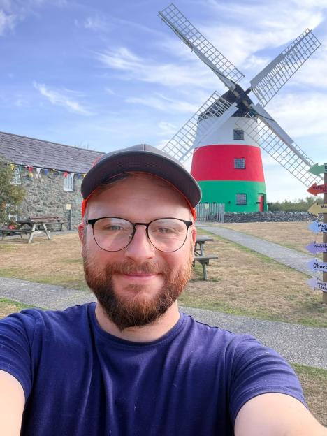 Windmill row erupts as owner ordered to repaint it after colourful makeover