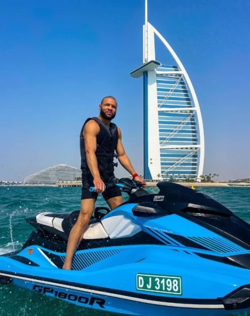 Chris Eubank Jr. on a jet ski in front of the Burj Al Arab in Dubai.