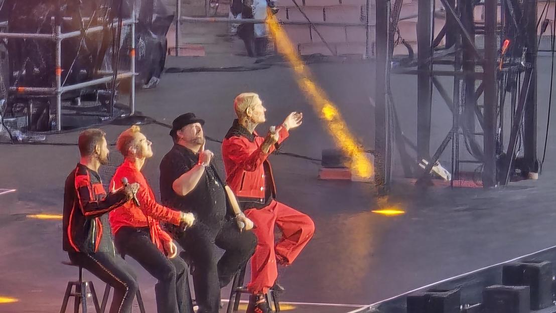 Boyzone with Mikey Graham performing at Emirates Stadium.