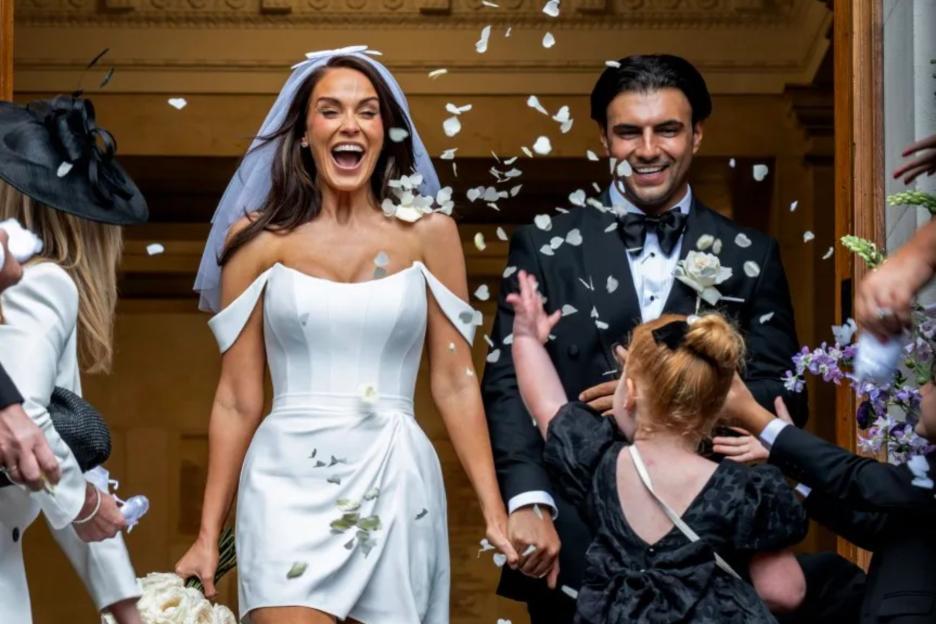 Vicky and Ercan leaving their wedding ceremony.