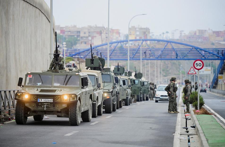 'Chaos at Spain's Border: Hundreds of Migrants Surge into Enclave Amid Reports of Gunfire as 49,000 Enter EU in Just One Day'