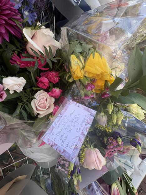 Floral tributes left at the scene of the alleged murder of Shanice Brookes.