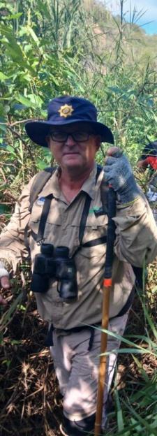 South African Police Captain Johan "Pottie" Potgieter who commands the Lowveld Division police diving unit who was hailed a hero after agreeing to be lowered onto a crocodile infested island to attach a harness to a crocodile that had been shot dead