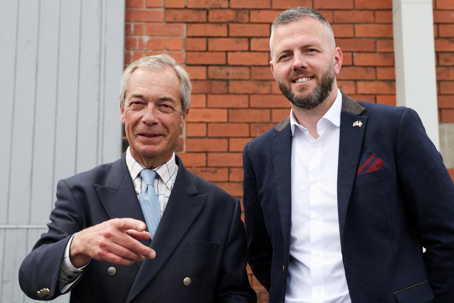 : Britain's Reform UK leader Farage and candidate Kenyon hold a press conference, in Ashton-in-Makerfield