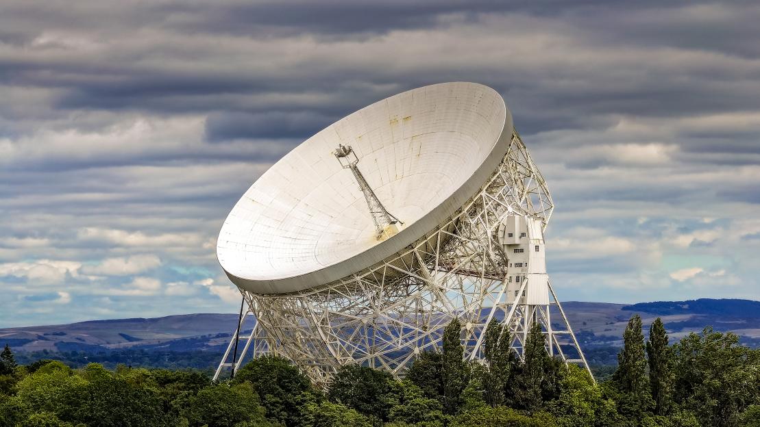 An aerial view of the Lovell Radio Telescope at Jodrell Bank, Cheshire, facing closure due to funding cuts.