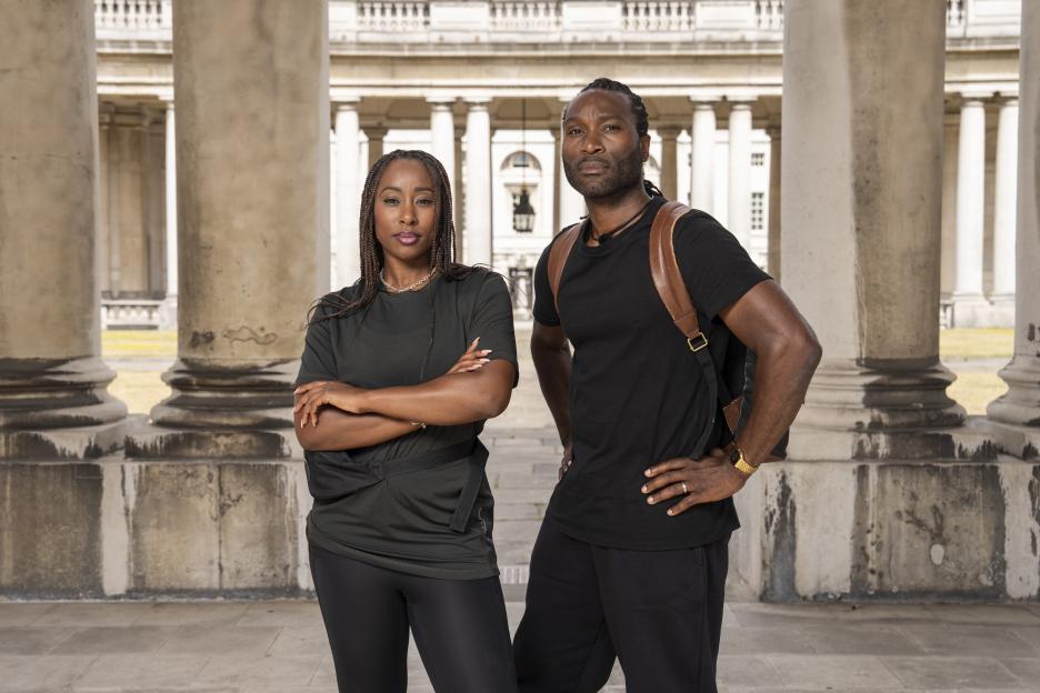 Scarlette with arms crossed and Stuart Douglas.