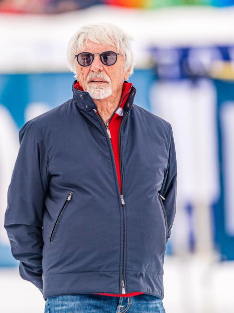 Bernie Ecclestone, wearing sunglasses and a blue jacket over a red sweater, attends the KitzCharityTrophy 2020.