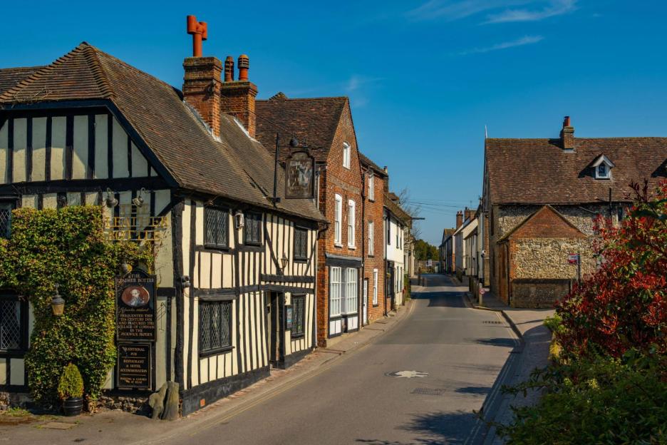Tragic Collision in UK Village: Two Cyclists Lose Lives and One Injured as Car Strikes Riders, Three Arrested