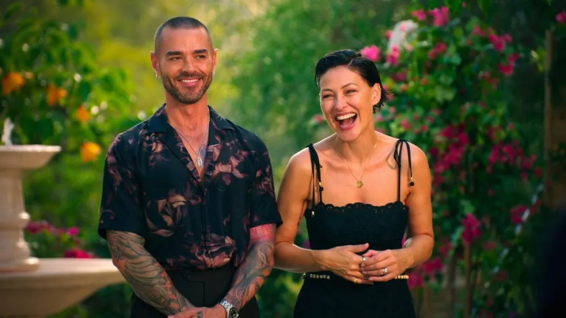 Matt and Emma Willis smiling outdoors.