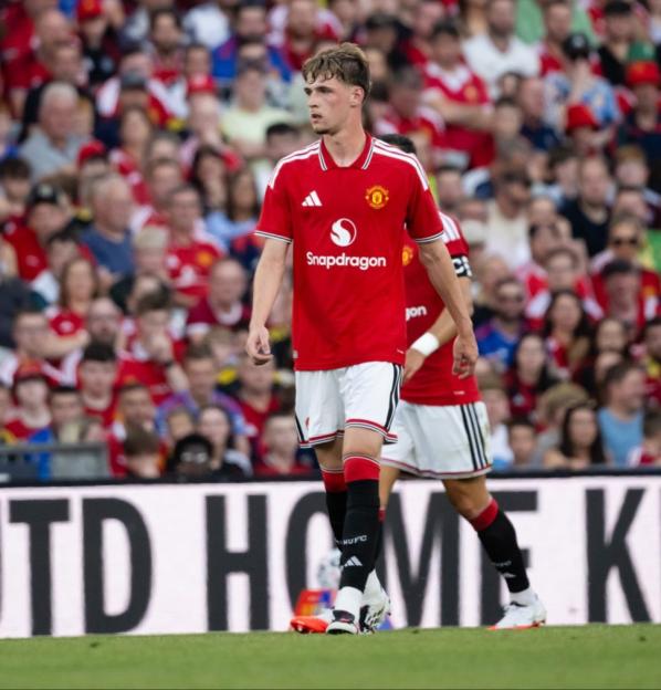 Football players from Leeds United and Manchester United on the field during a pre-season friendly.