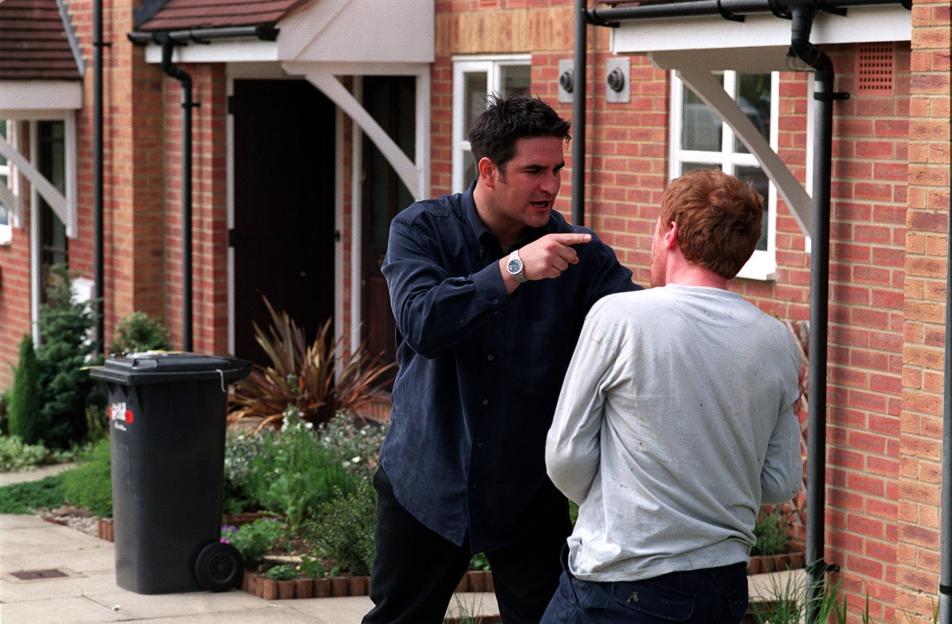 Marc Bannerman as Gianni verbally confronting Forbes Masson as Rod.