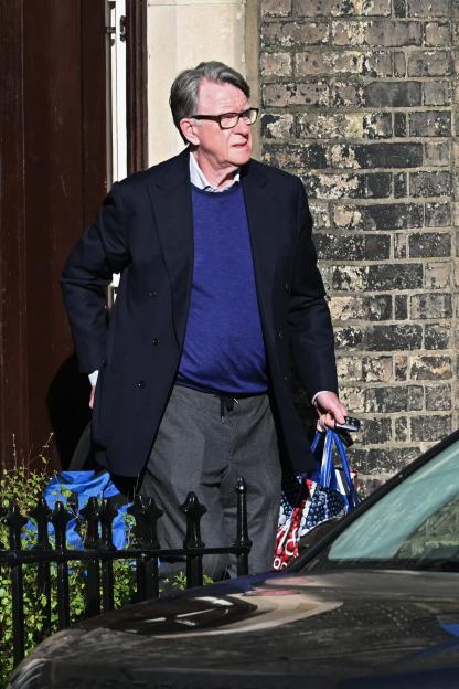 Peter Mandelson, former UK Ambassador to the United States, leaving his residence in central London.