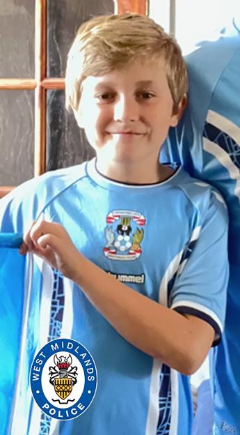 Keaton Slater in a light blue sports jersey.