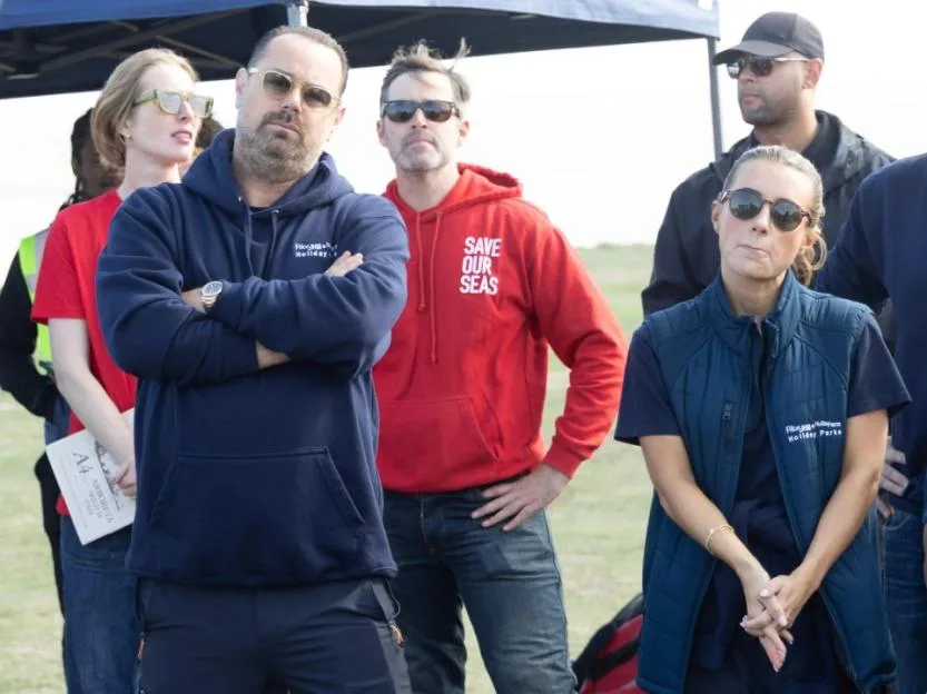 Danny Dyer with his arms crossed at an SOS Whitstable Stop the Sewage protest.