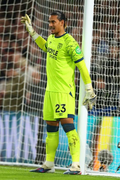 Alphonse Areola of West Ham United gestures during a Premier League match.