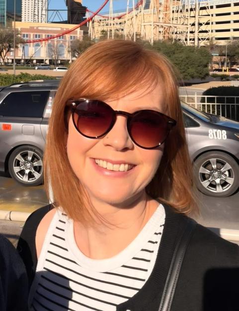 Amy Seager smiling while wearing sunglasses.