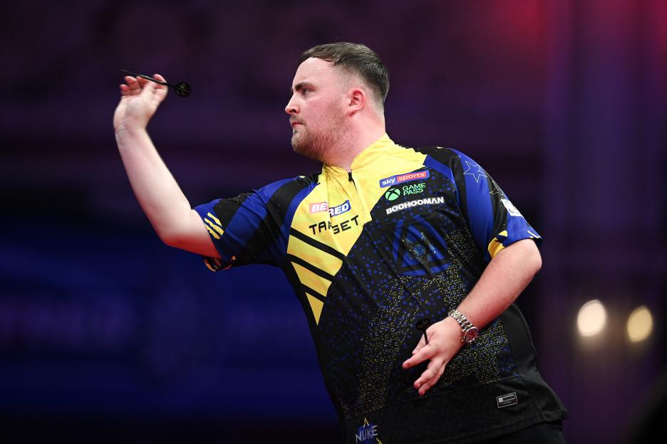 Luke Littler throwing a dart during the Quarter Final of the 2026 Betfred World Matchplay.