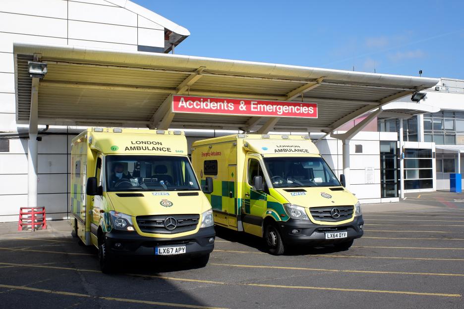 Ambulances outside Accidents and Emergencies entrance at Hillingdon Hospital, Uxbridge