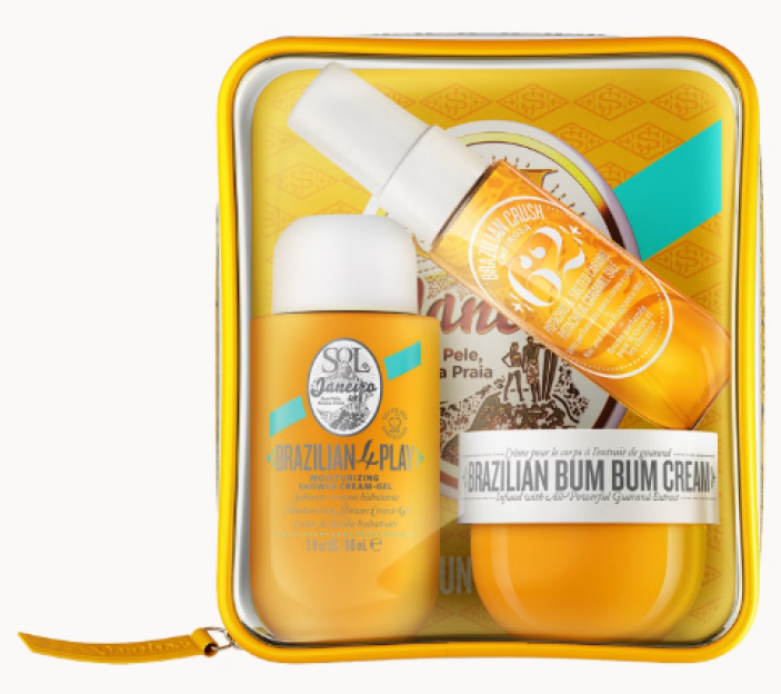 Sol de Janeiro mini gift set with three orange bottles in a clear yellow pouch.