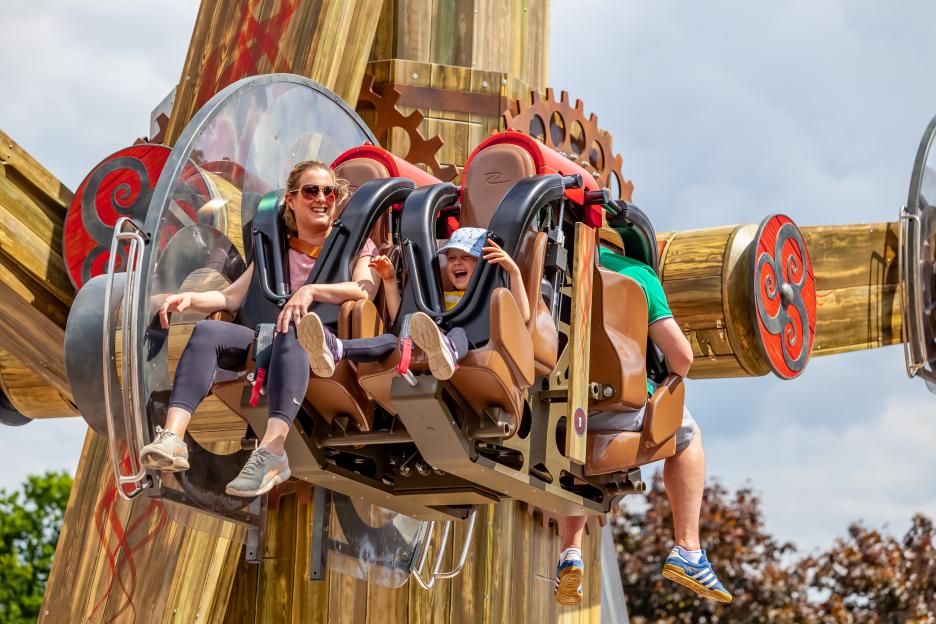 People on a Drayton Manor theme park ride.