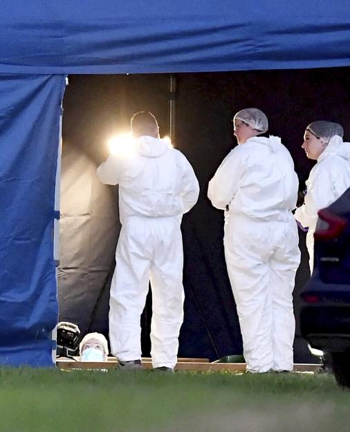 Police exhume body from burial ground following death of woman four years ago
