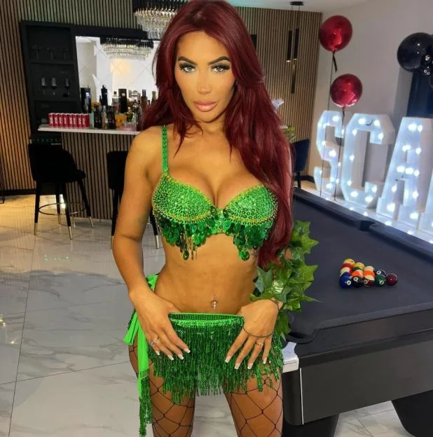 Chloe Ferry wearing a Poison Ivy Halloween costume.