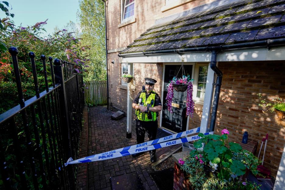 A scene remains at a property on Holywell Heights in Sheffield, South Yorkshire, where a newborn baby was found dead.