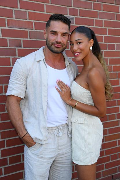 Aleks Petrovic and Vanessa Nwattu pose for a photo at an event.