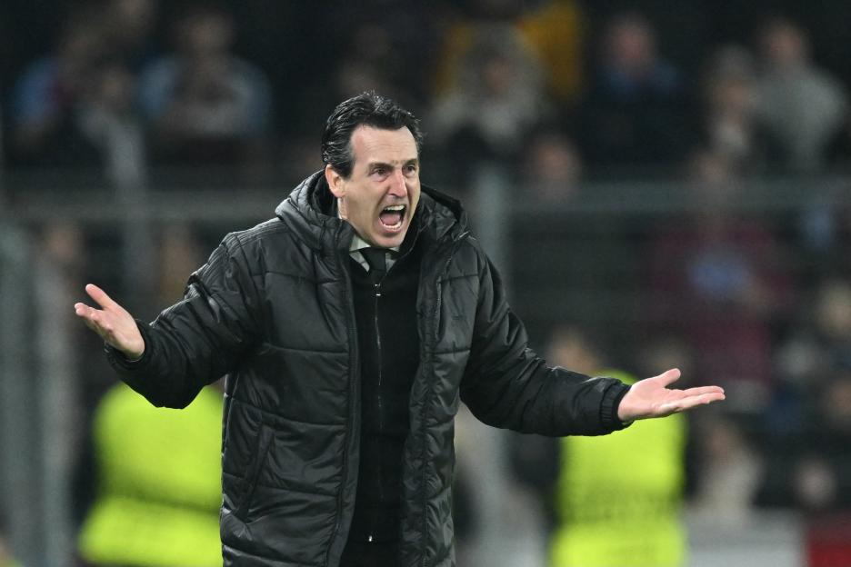 Aston Villa's Spanish coach Unai Emery shouts instructions to his players from the touchline.