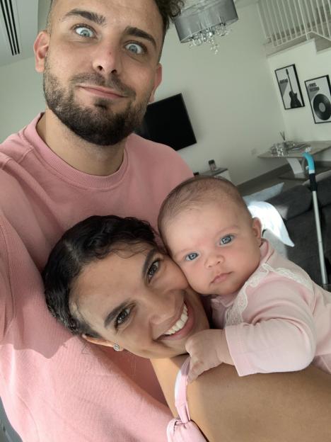 Charlotte Lescott and Ali Watson with their daughter Soulie.