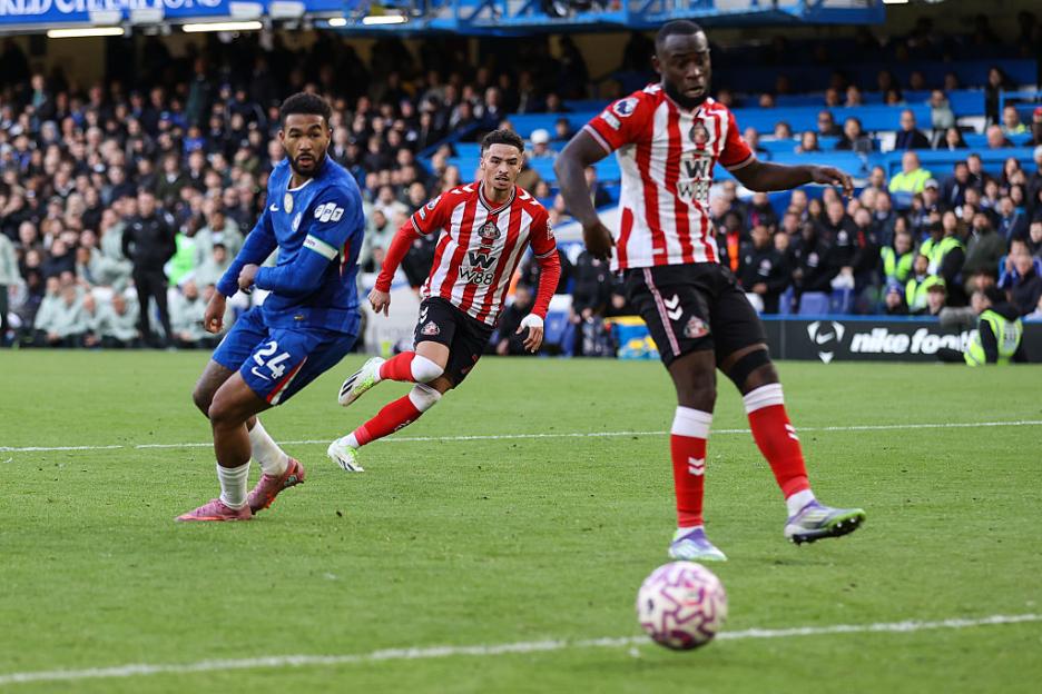 Three male football players on a green pitch during the Chelsea v Sunderland Premier League match.