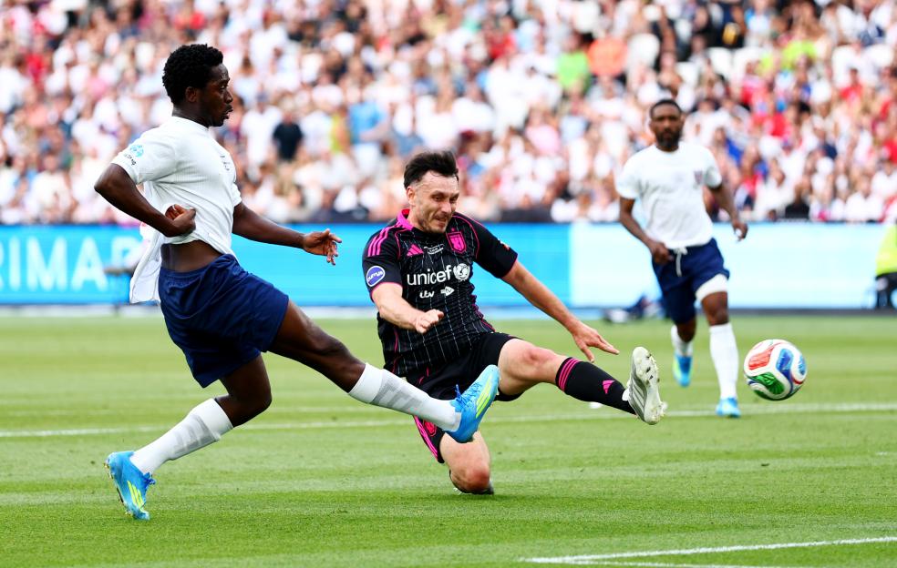 Players in England XI v World XI Soccer Aid match.