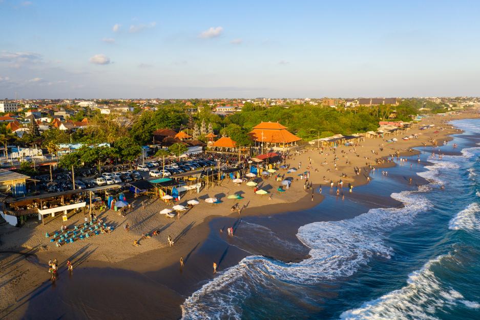 Aerial view of the late evening on the famous Berawa beach in Canggu in Bali, Indonesia